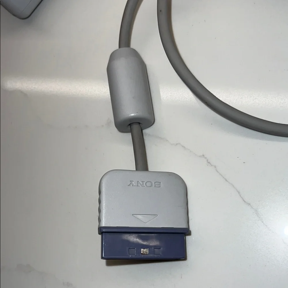 Sony PlayStation Gray Multi-Tap Adapter